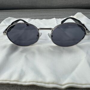 Prada PR 65ZS oval Sunglasses